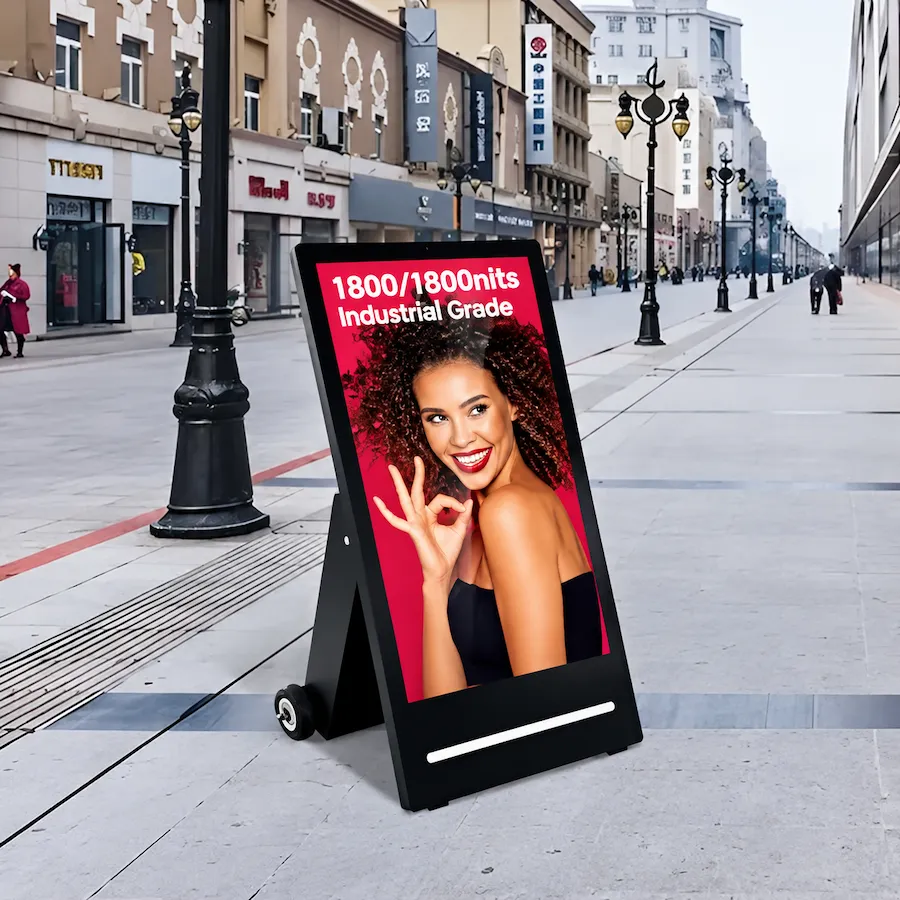 curbside advertising display standing on a busy pedestrian street